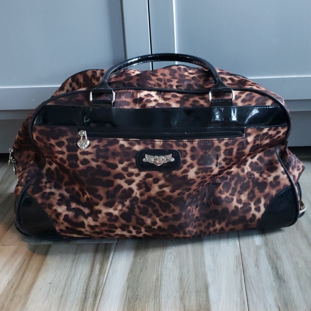 Kathy Van Zeeland | Rolling Luggage